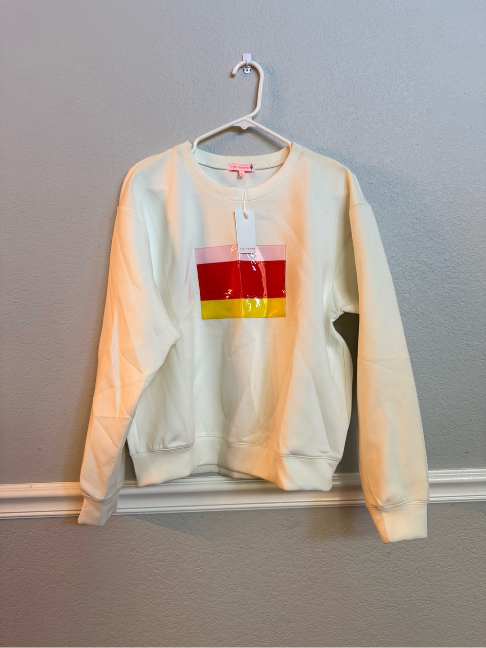 NWT re:named Cream Crewneck Sweater with Red and Yellow Block Graphic